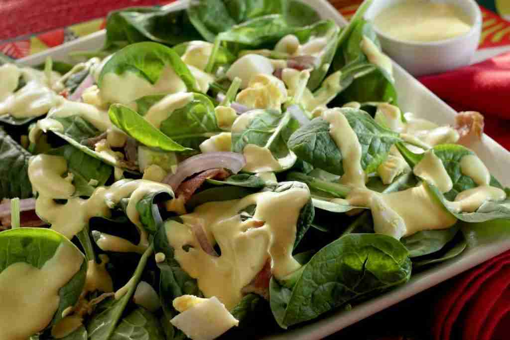 A plead of salad greens with old maid dressing