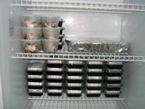 Magic follows her into the kitchen